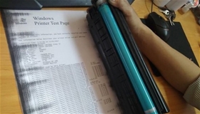 Nguyên nhân và cách sửa máy in bị lem mực một bên